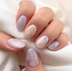 Top 10 stunning spring nail colors to try in 2025 for a fresh new look