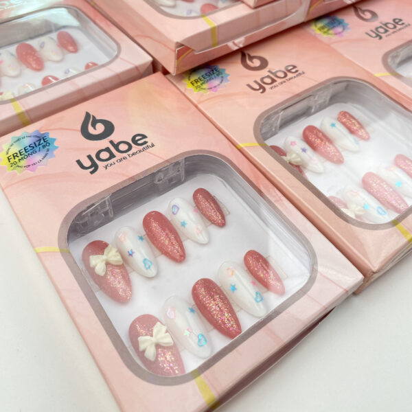 Pink starry bow press on nails